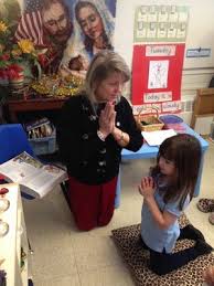 teaching children to pray and be kind to one another 