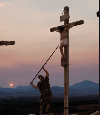 Roman soldier spears the body of Jesus on the cross