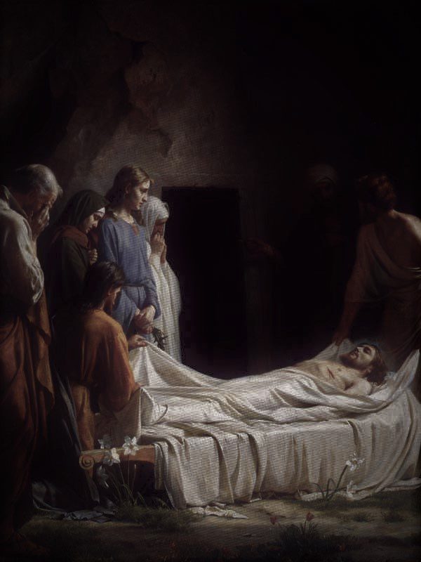 body of Jesus outside tomb of Joseph with others