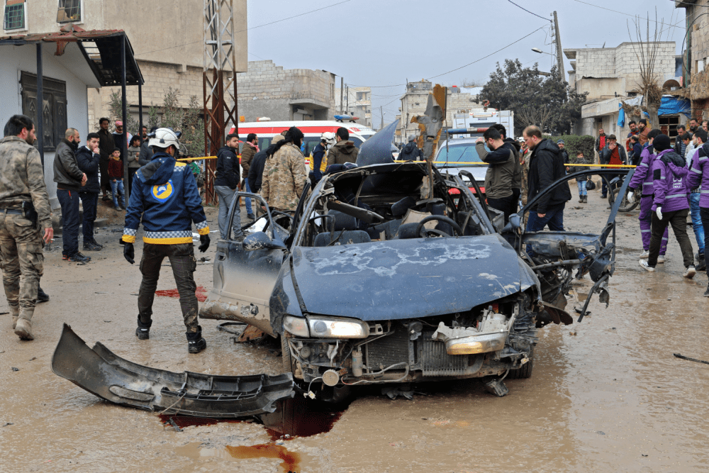 A picture shows the scene after an explosive device exploded in a taxi in Syria's town of Azaz in the rebel-controlled northern countryside of Syria's Aleppo province near the border with Turkey, on January 13. -/AFP VIA GETTY IMAGES